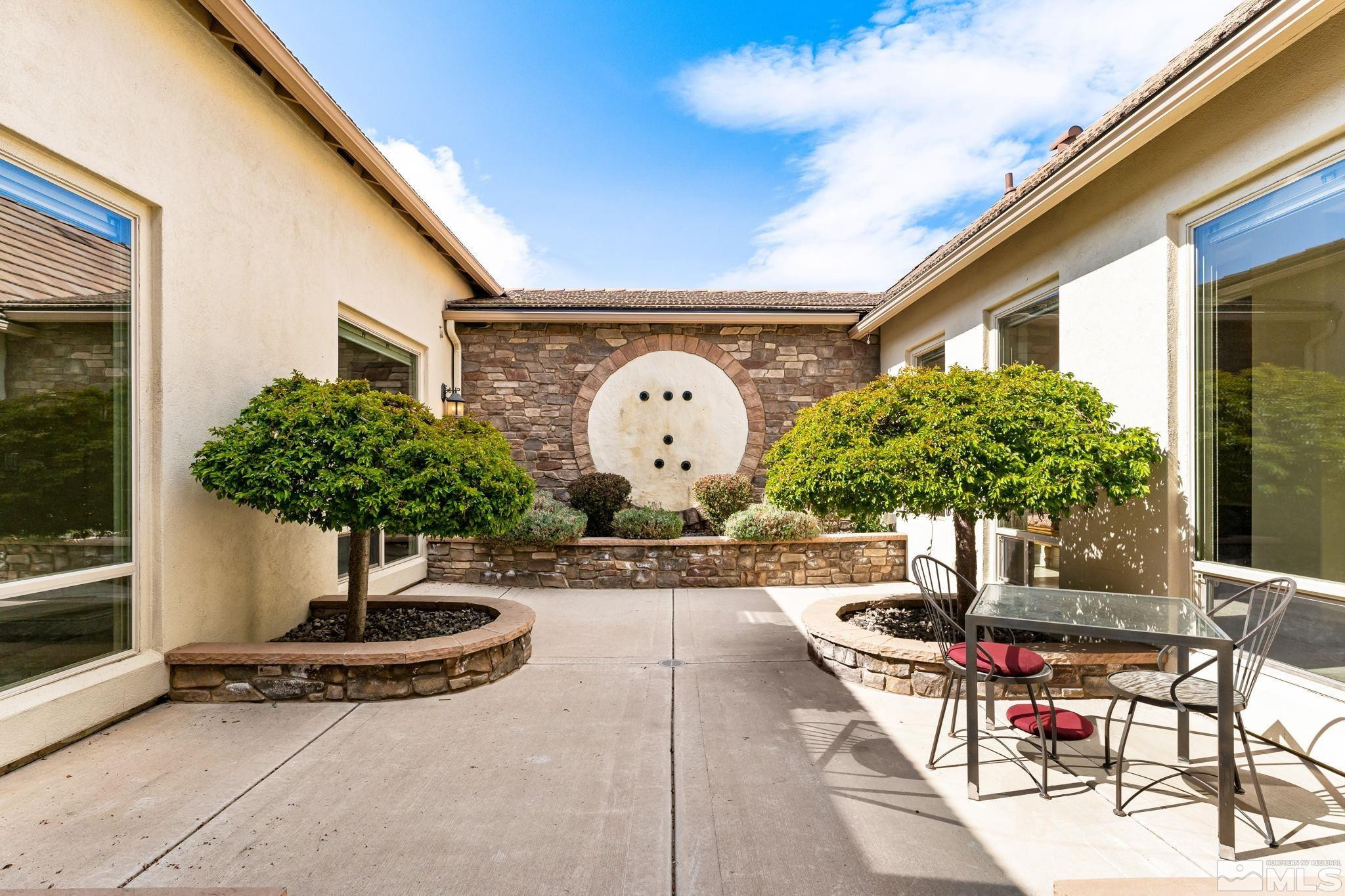 13395 Damonte View Lane Reno, NV 89511 - Photo 36 of 40 a front view of a house with garden