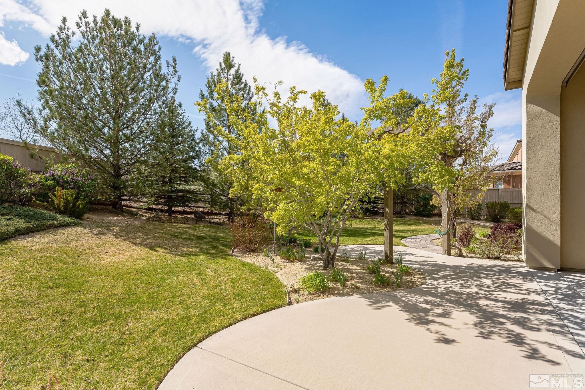 13395 Damonte View Lane Reno, NV 89511 - Photo 40 of 40 a view of swimming pool with lawn chairs and plants