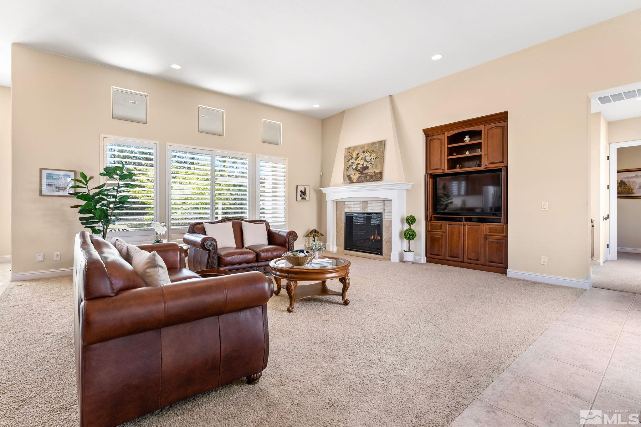 13395 Damonte View Lane Reno, NV 89511 - Photo 6 of 40 a living room with furniture and a fireplace