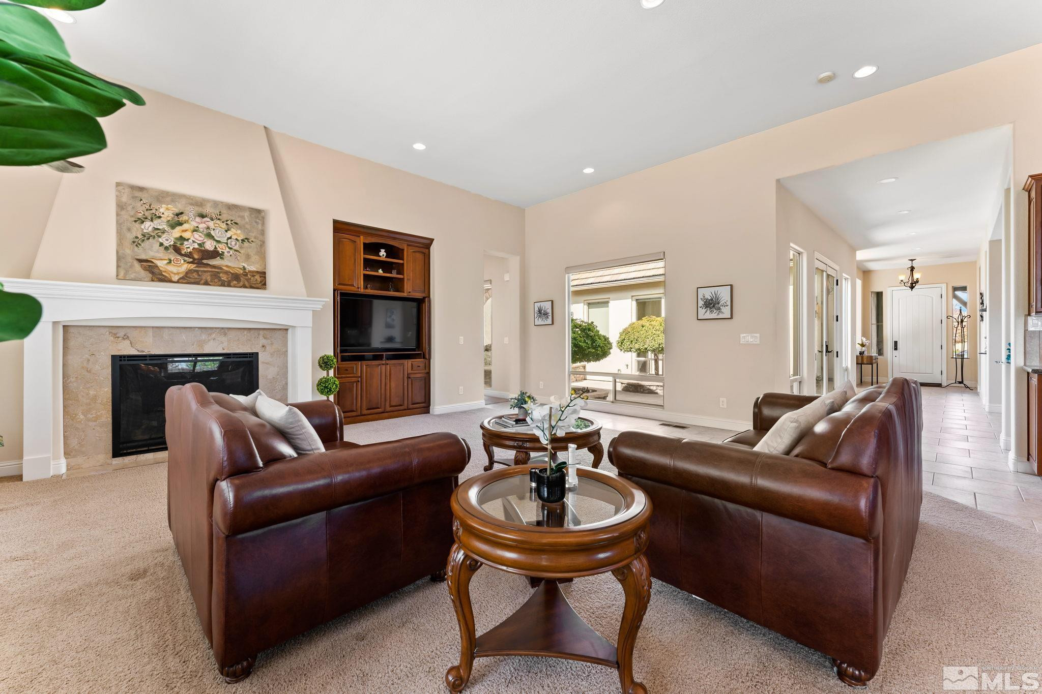 13395 Damonte View Lane Reno, NV 89511 - Photo 8 of 40 a living room with furniture and a fireplace