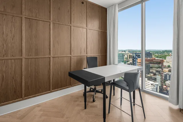 a view of a tables and chair in the room