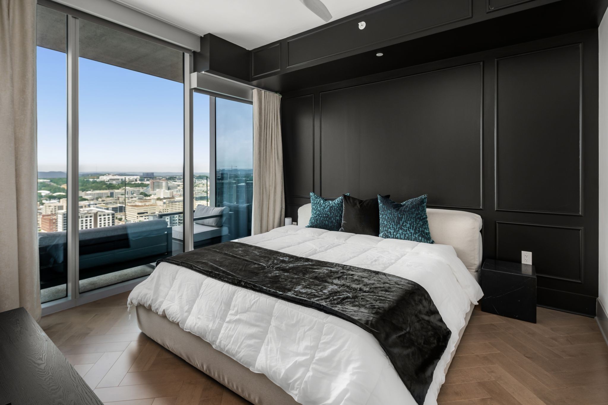 1616 West End Avenue, Unit 2609 Nashville, TN 37203 - Photo 15 of 46 a bedroom with a large bed and a large window