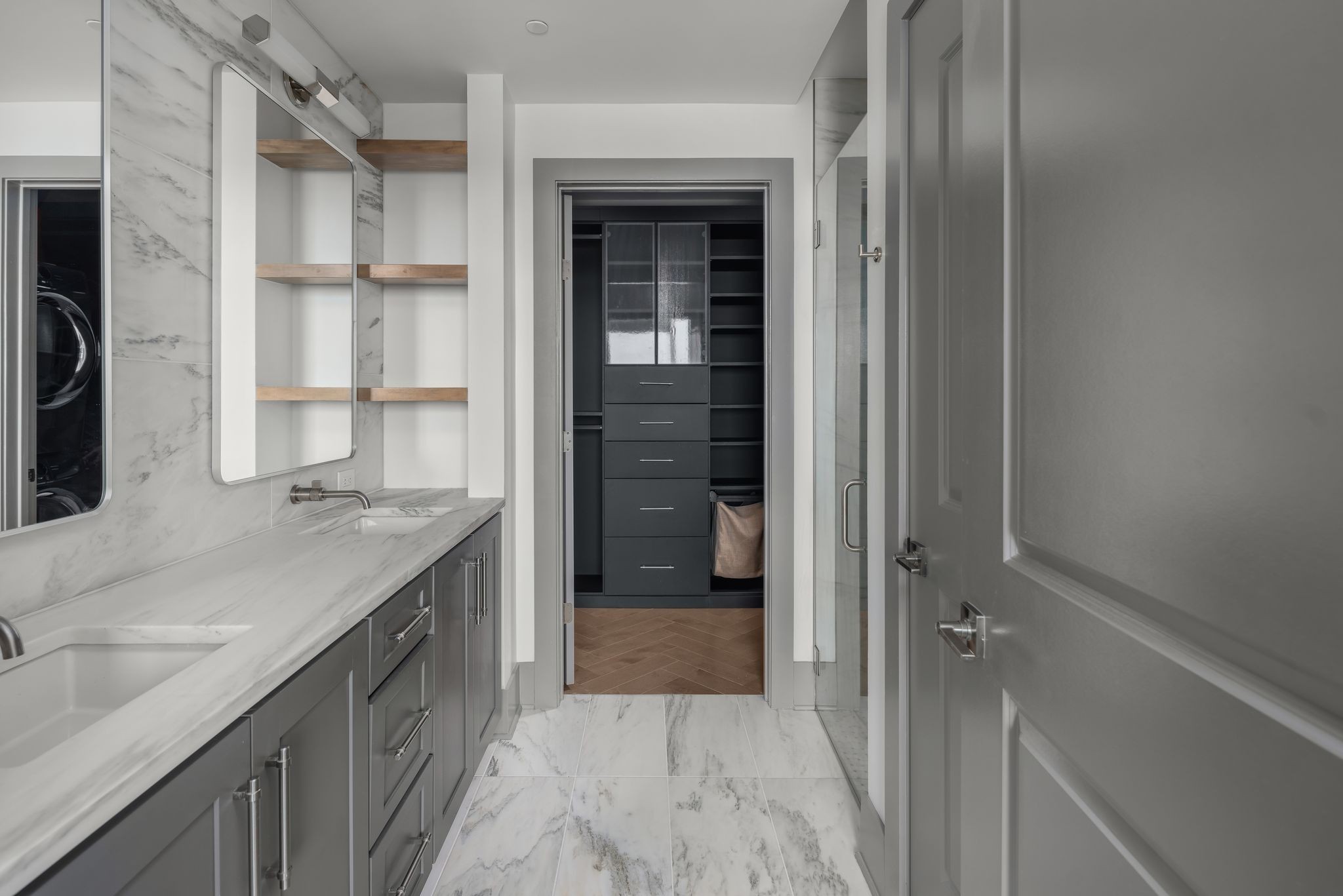 1616 West End Avenue, Unit 2609 Nashville, TN 37203 - Photo 17 of 46 a bathroom with a granite countertop sink a mirror and a shower