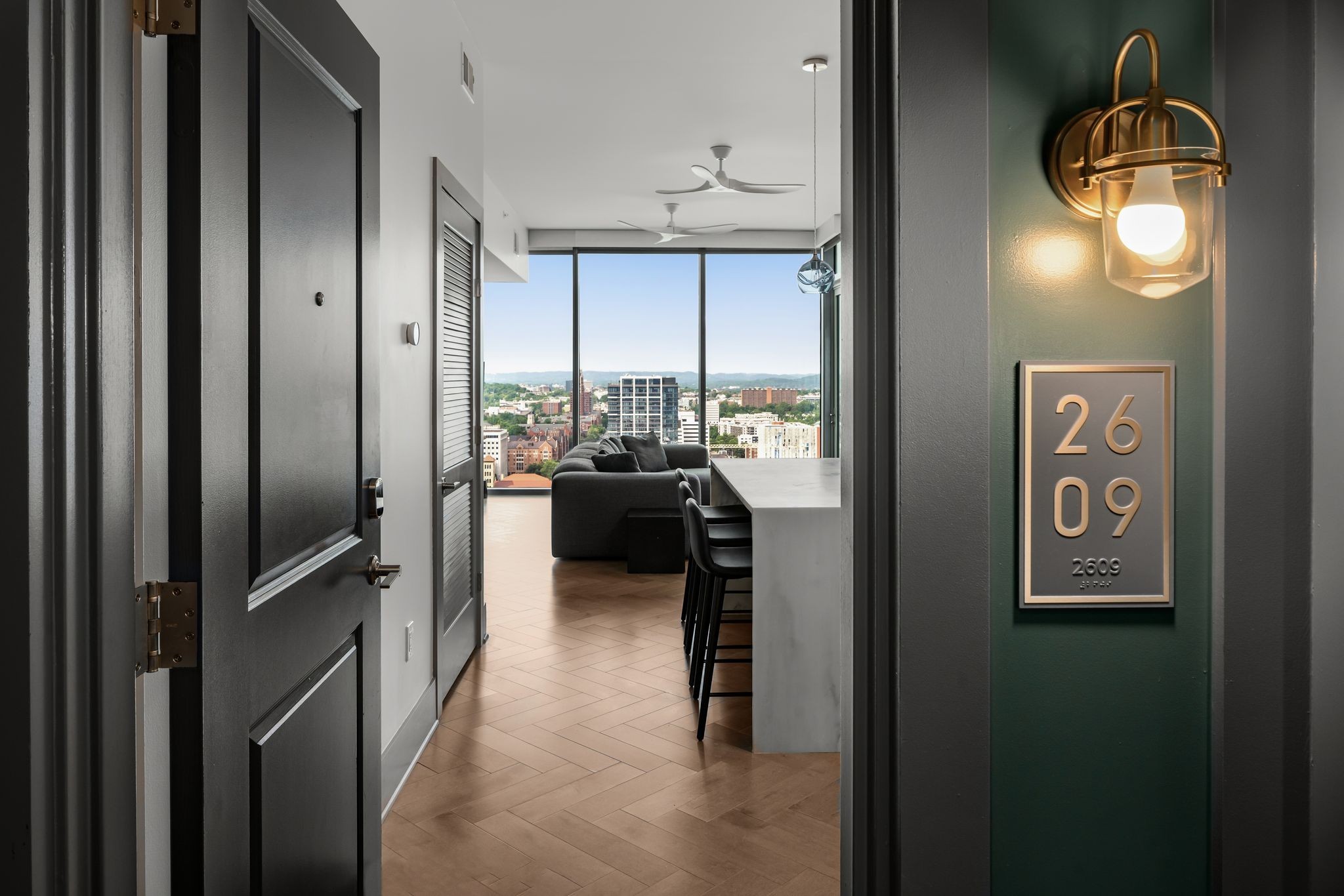 1616 West End Avenue, Unit 2609 Nashville, TN 37203 - Photo 2 of 46 a view of a entryway door and living room