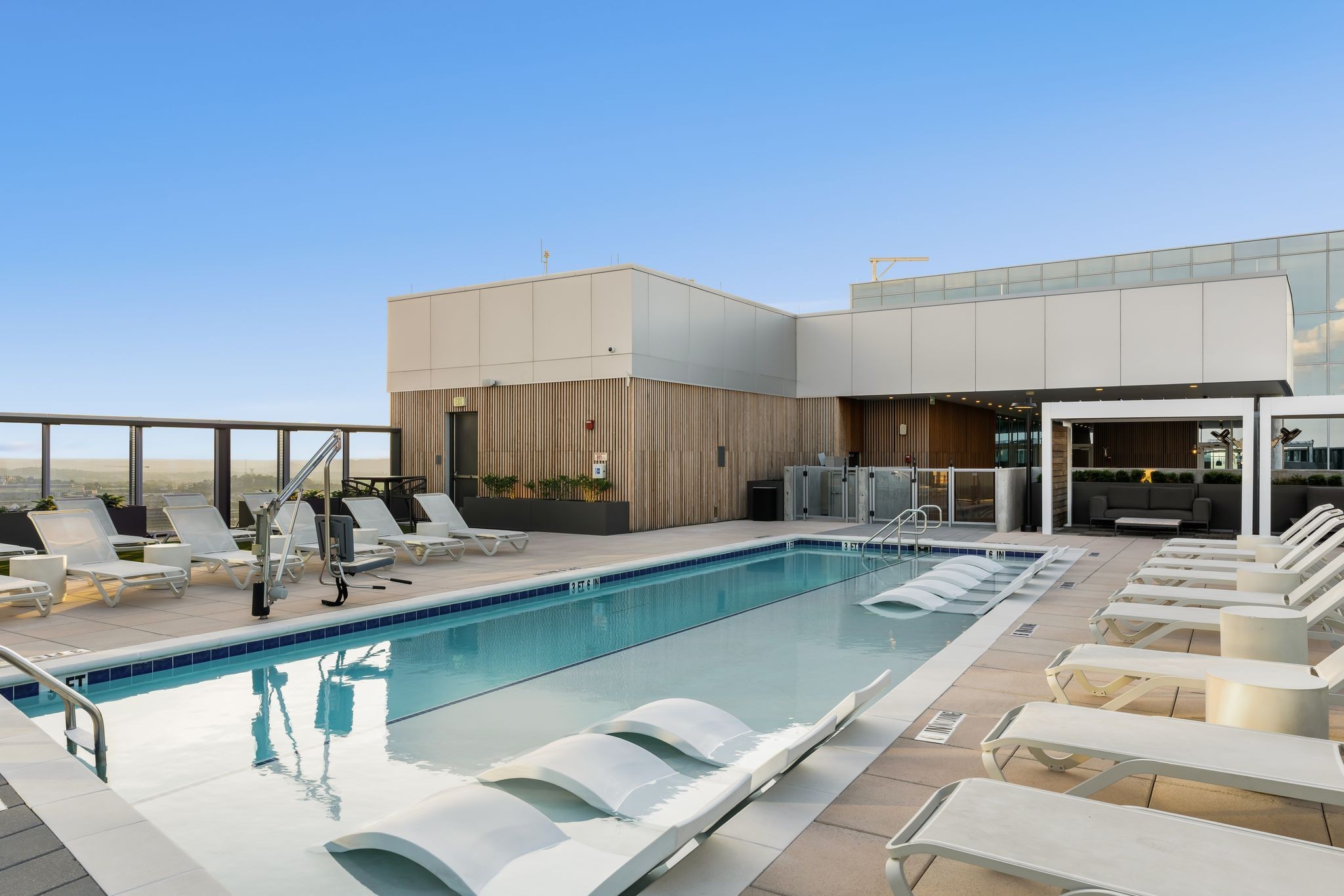 1616 West End Avenue, Unit 2609 Nashville, TN 37203 - Photo 25 of 46 a swimming pool with outdoor seating and yard