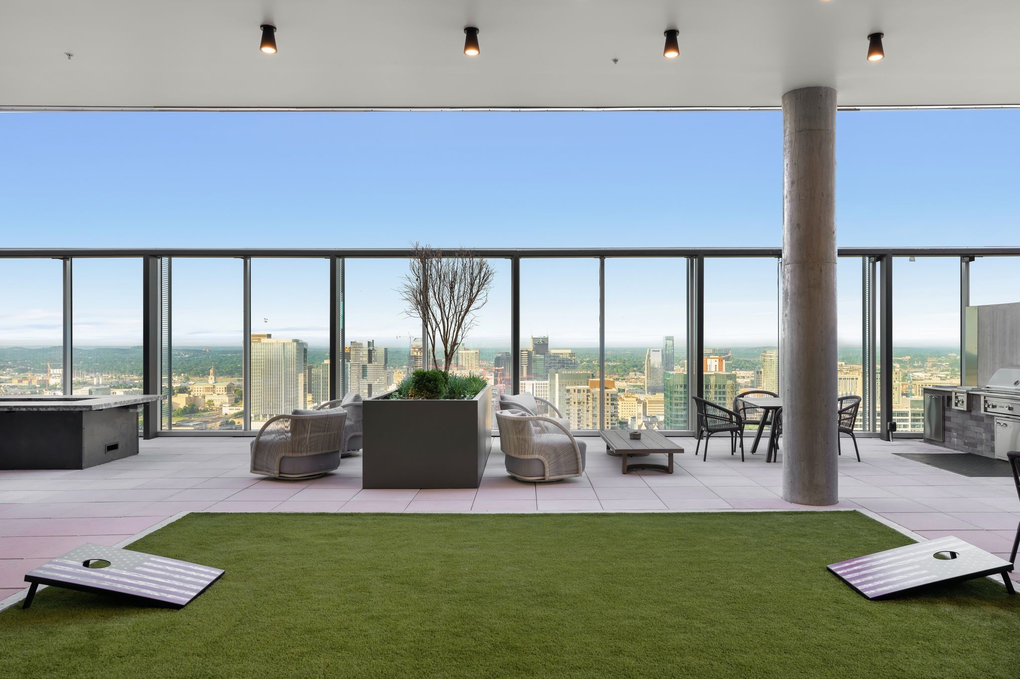 1616 West End Avenue, Unit 2609 Nashville, TN 37203 - Photo 26 of 46 a living room with furniture and floor to ceiling window
