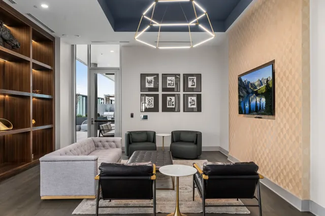 a view of a lobby with furniture and window
