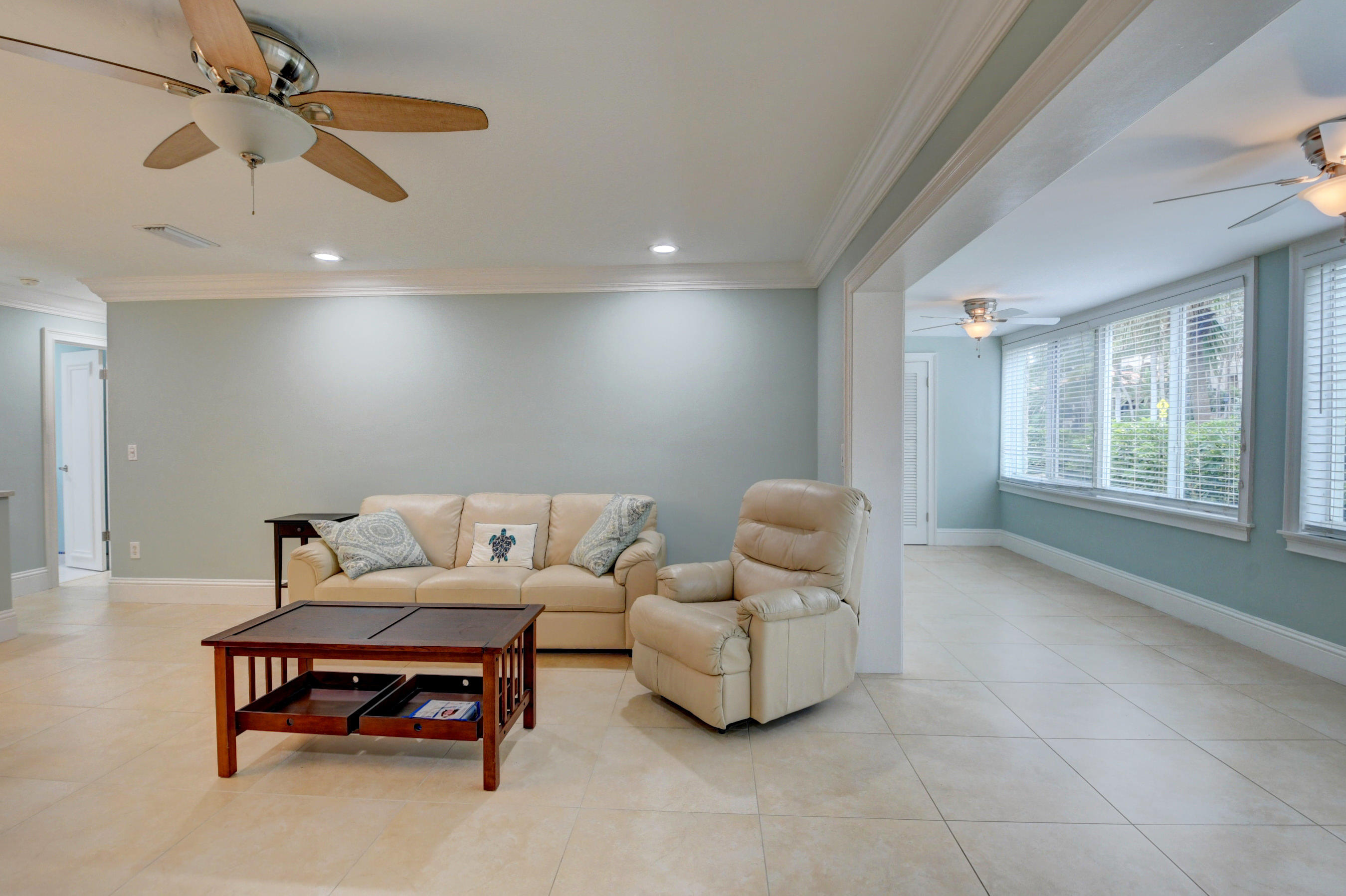 2561 South Ocean Boulevard, Unit 3 Boca Raton, FL 33432 - Photo 15 of 47 Living Room and Lanai