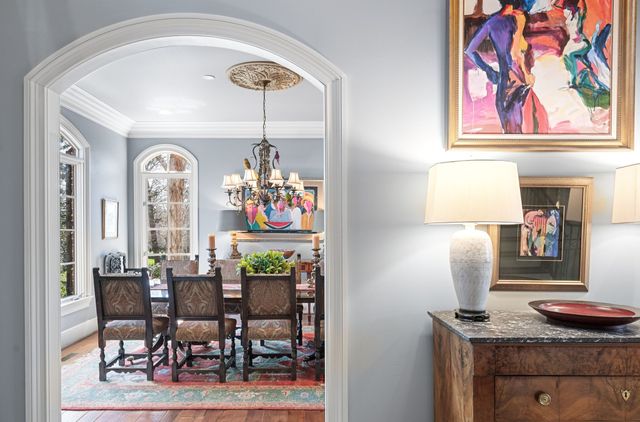 a bathroom with a sink a mirror and a toilet