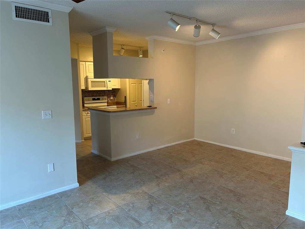 17150 North Bay Road, Unit 2519 Sunny Isles Beach, FL 33160 - Photo 2 of 9 an empty room with a bathroom and a sink