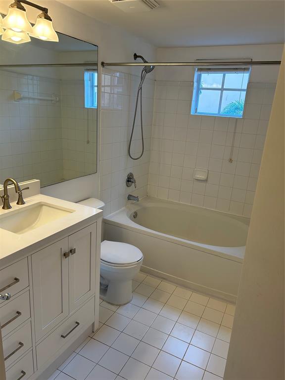 17150 North Bay Road, Unit 2519 Sunny Isles Beach, FL 33160 - Photo 5 of 9 a bathroom with a sink a toilet and shower
