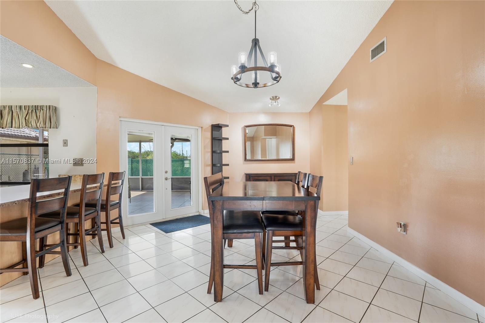 15440 Gauntlet Hall Manor Davie, FL 33331 - Photo 9 of 18 a view of a dining room with furniture