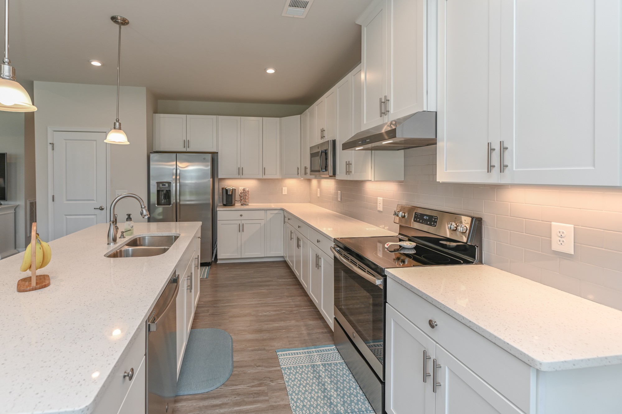 2907 Kellner Drive Murfreesboro, TN 37128 - Photo 12 of 33 a kitchen with stainless steel appliances granite countertop a sink stove and refrigerator
