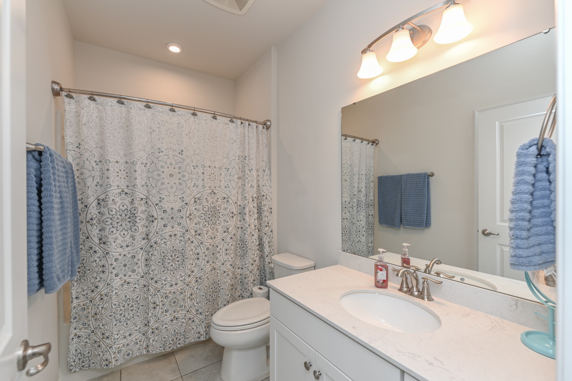 2907 Kellner Drive Murfreesboro, TN 37128 - Photo 24 of 33 a bathroom with a sink toilet and shower