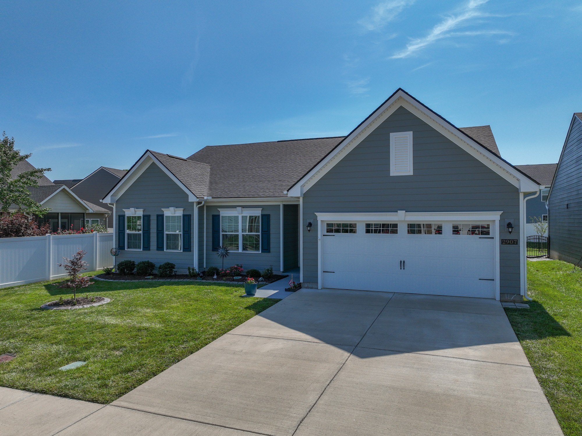 2907 Kellner Drive Murfreesboro, TN 37128 - Photo 33 of 33 a front view of a house with a yard and garage