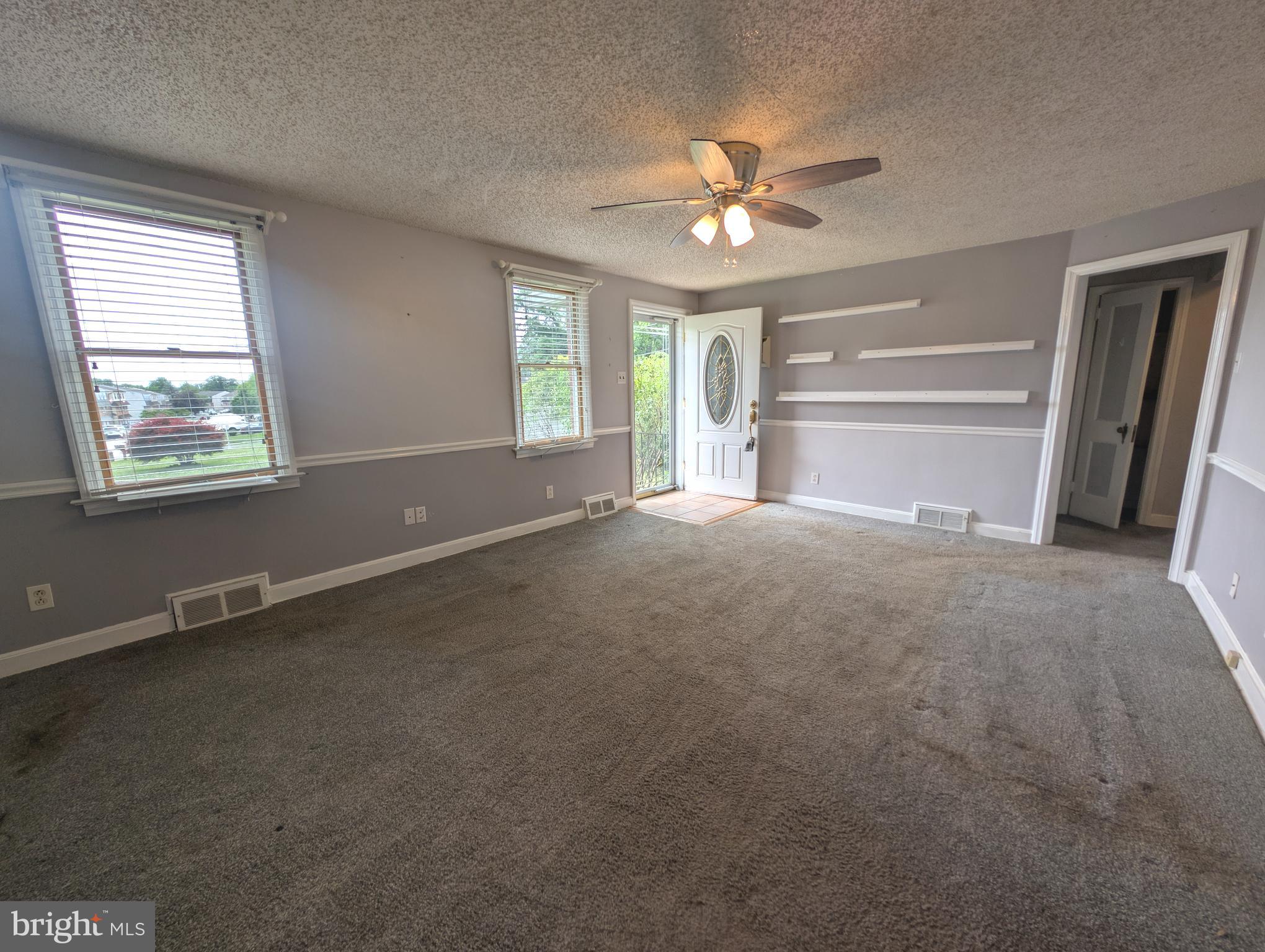 1129 Providence Road Springfield, PA 19064 - Photo 3 of 15 a view of an empty room with a window