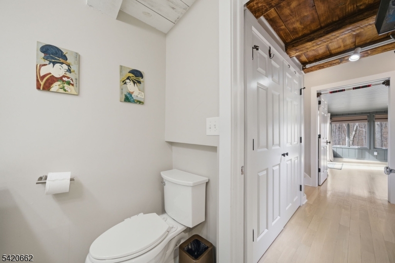109 Taylortown Road Montville, NJ 07005 - Photo 26 of 50 a white toilet sitting next to a bathroom sink