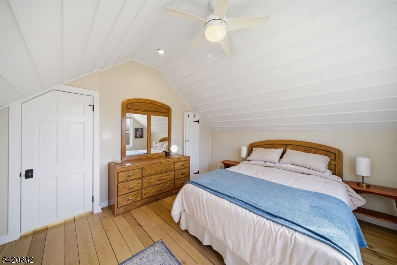 109 Taylortown Road Montville, NJ 07005 - Photo 33 of 50 a bedroom with a bed and a dresser