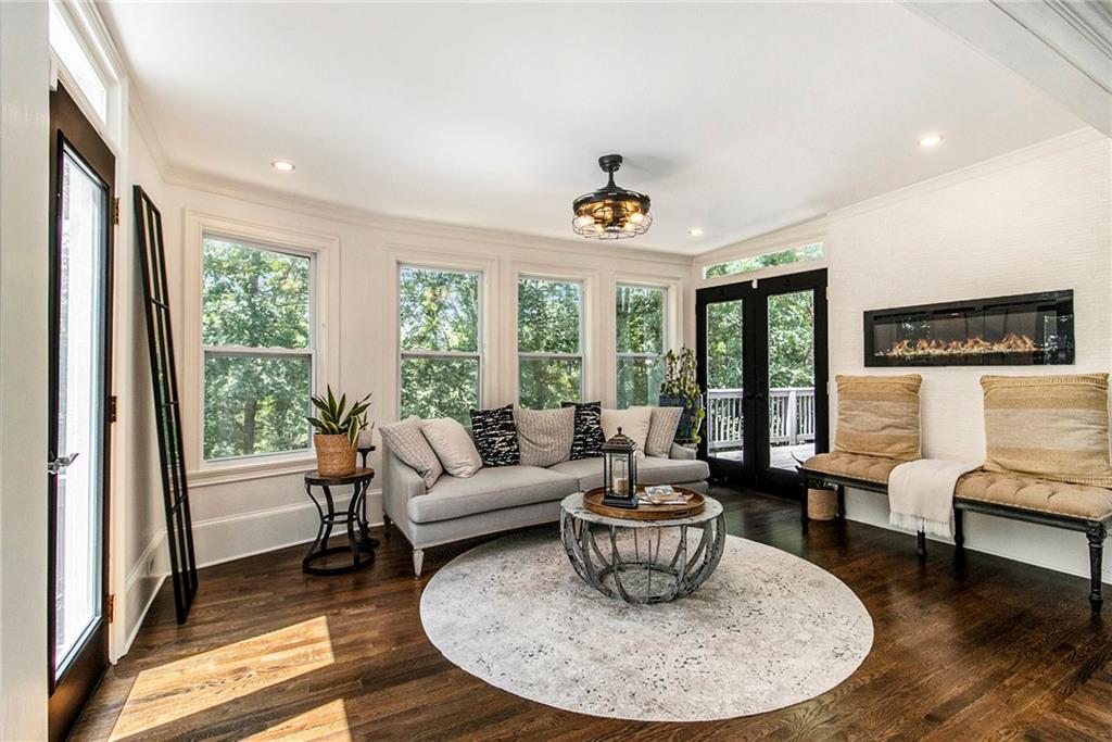 240 Wicklawn Way Roswell, GA 30076 - Photo 16 of 62 a living room with furniture and a large window