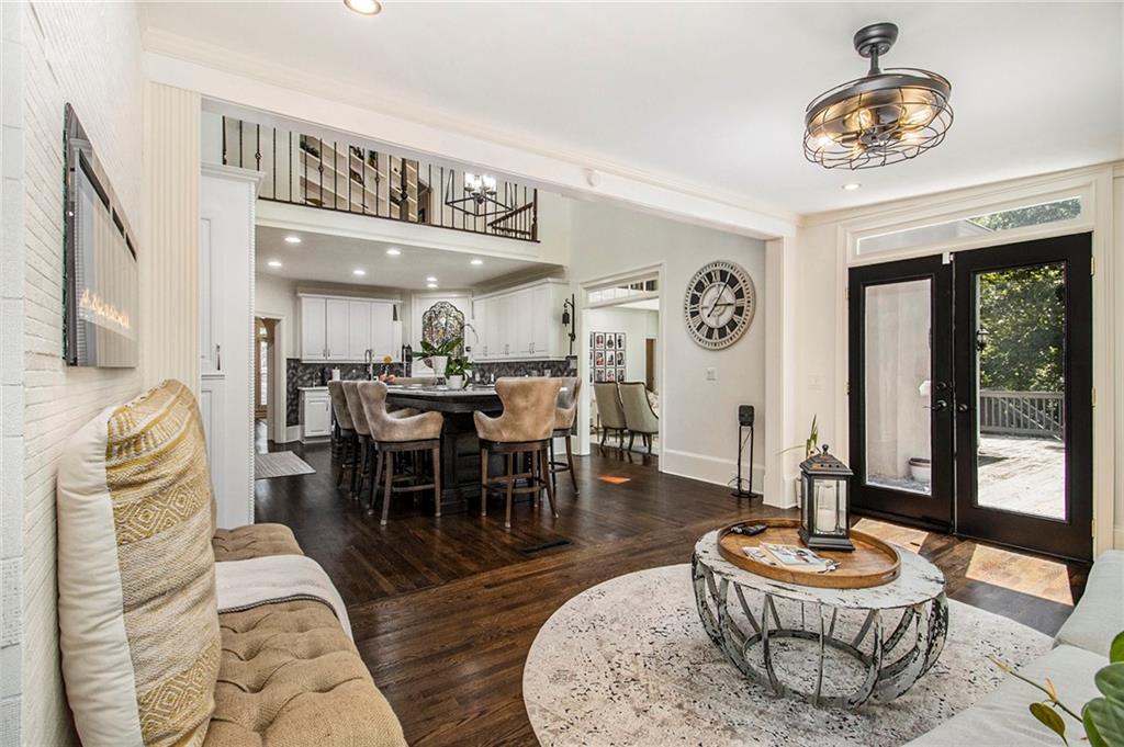 240 Wicklawn Way Roswell, GA 30076 - Photo 17 of 62 a living room with furniture and a large window