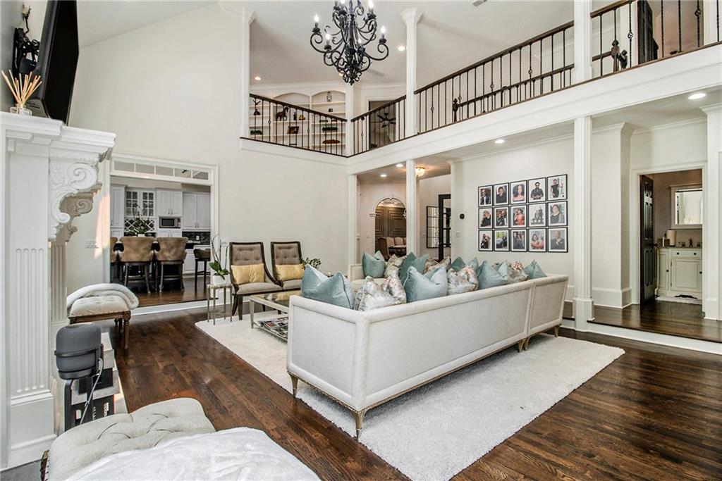 240 Wicklawn Way Roswell, GA 30076 - Photo 18 of 62 a living room with furniture and a chandelier