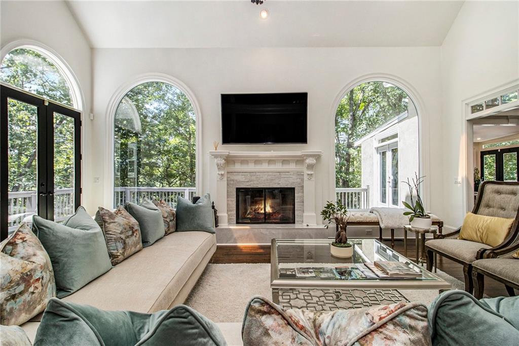 240 Wicklawn Way Roswell, GA 30076 - Photo 20 of 62 a living room with furniture fireplace and flat screen tv