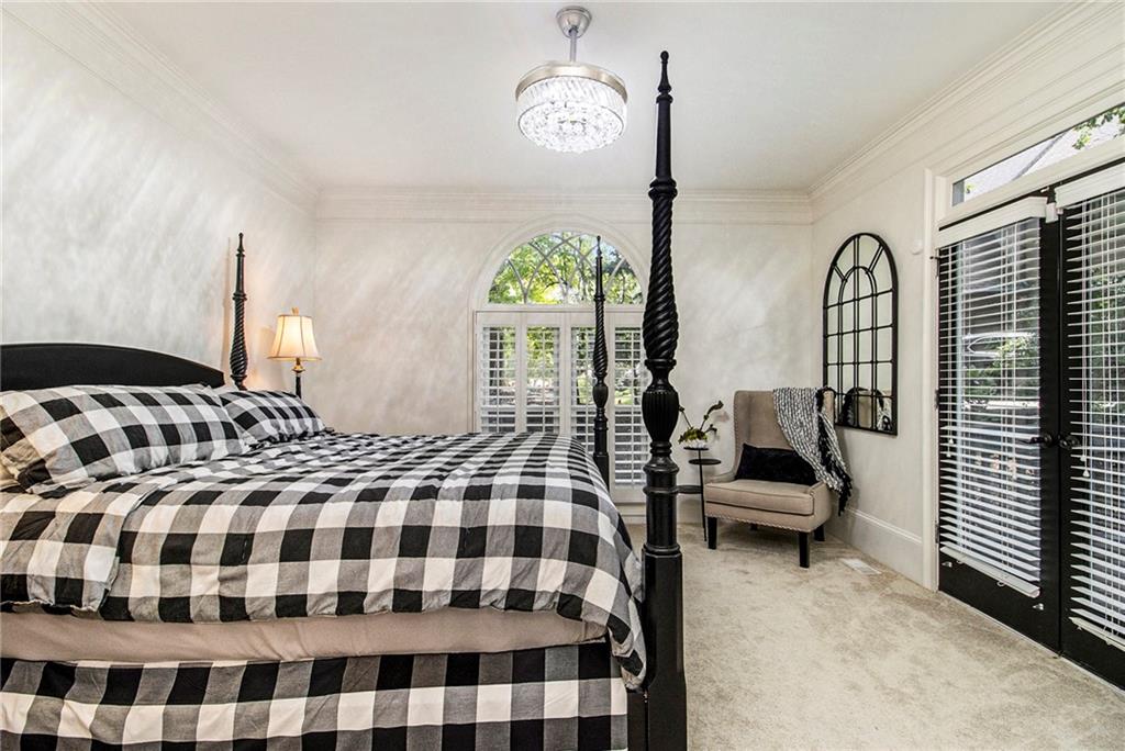 240 Wicklawn Way Roswell, GA 30076 - Photo 33 of 62 a bedroom with a bed and a lamp next to a window