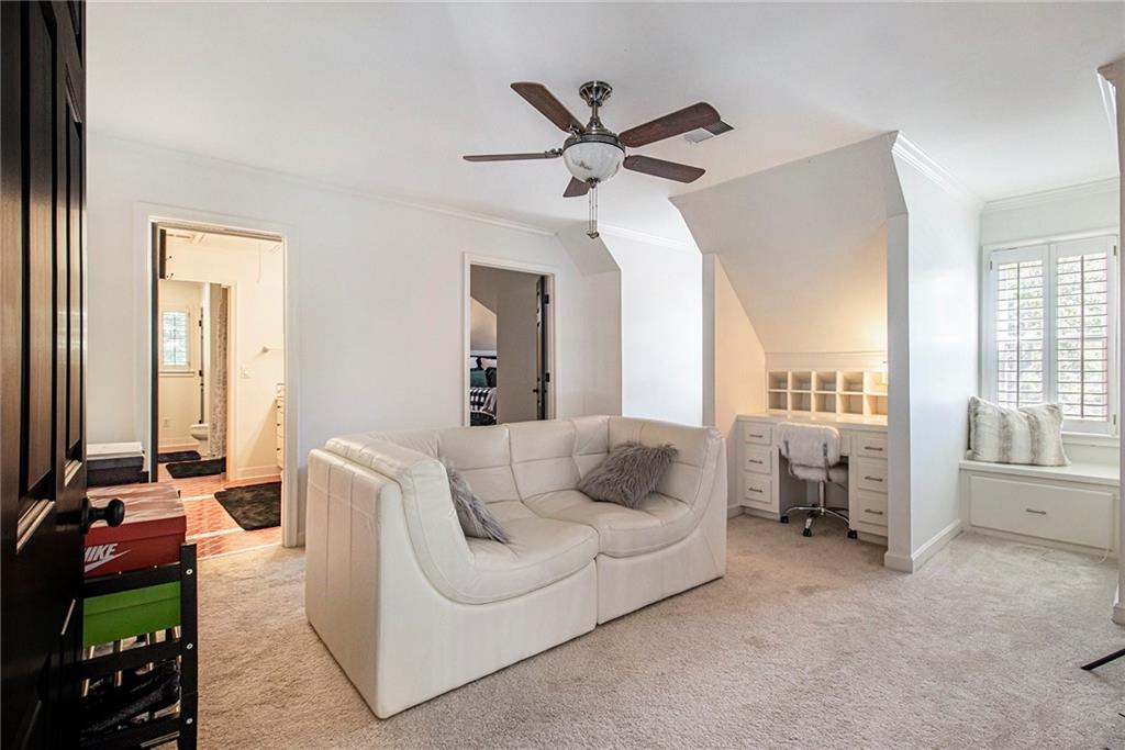 240 Wicklawn Way Roswell, GA 30076 - Photo 38 of 62 a living room with furniture and a flat screen tv