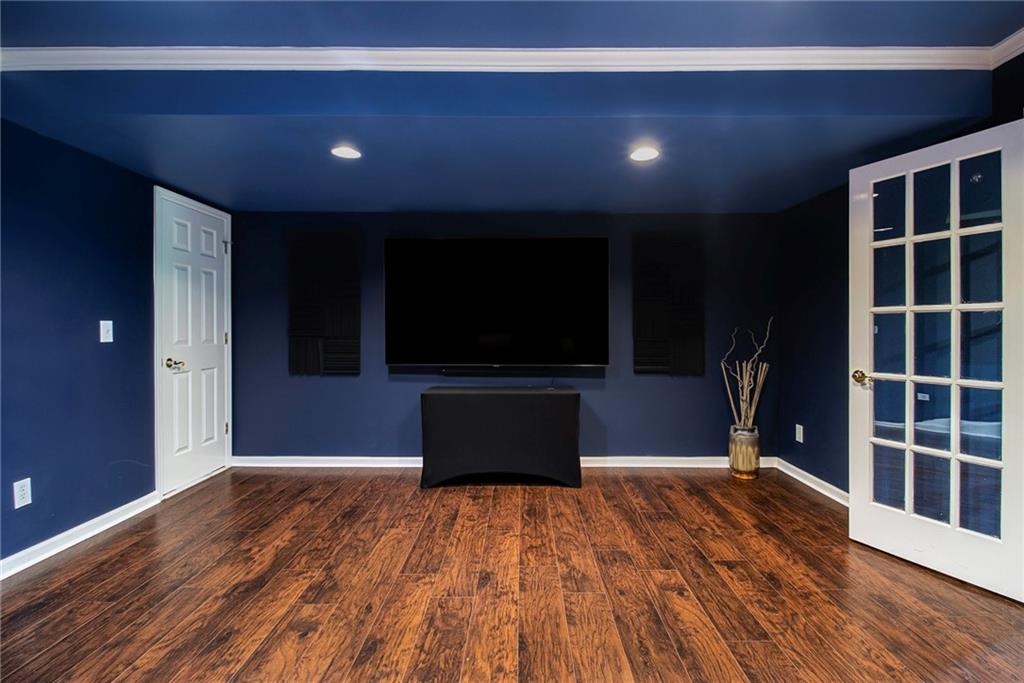 240 Wicklawn Way Roswell, GA 30076 - Photo 54 of 62 a view of room with wooden floor and furniture