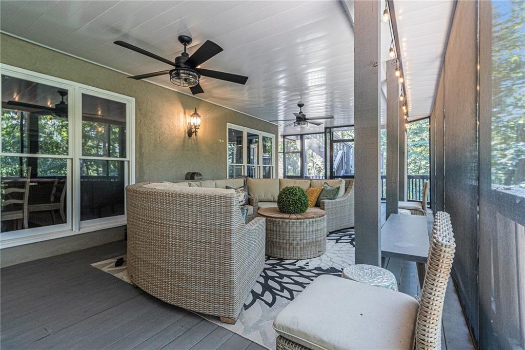 240 Wicklawn Way Roswell, GA 30076 - Photo 58 of 62 a living room with furniture and a large window