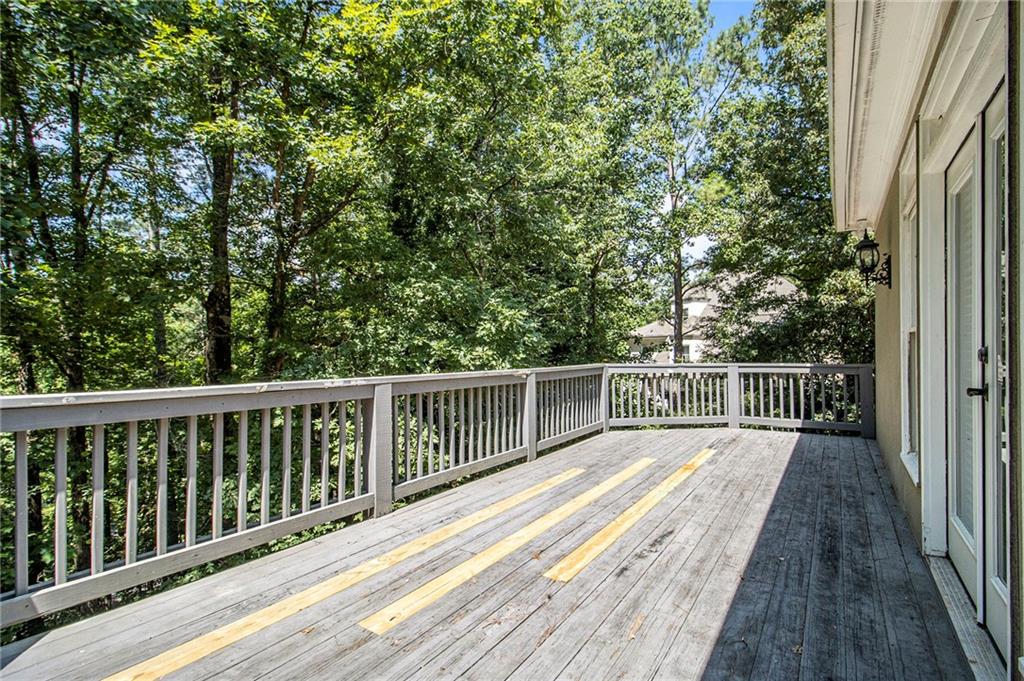 240 Wicklawn Way Roswell, GA 30076 - Photo 61 of 62 a view of balcony with wooden floor and fence