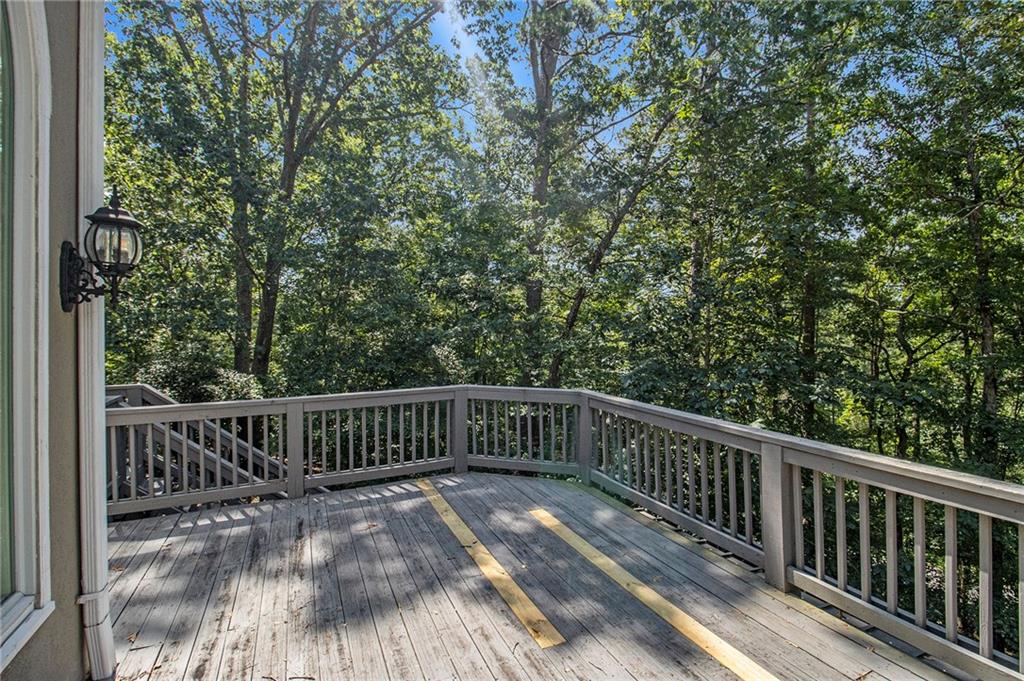 240 Wicklawn Way Roswell, GA 30076 - Photo 62 of 62 a view of balcony with wooden floor and fence