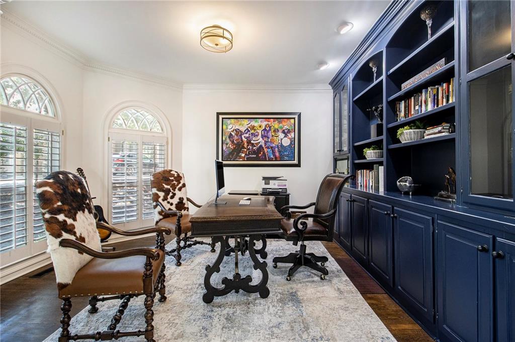 240 Wicklawn Way Roswell, GA 30076 - Photo 8 of 62 a view of a workspace with furniture and a bookshelf