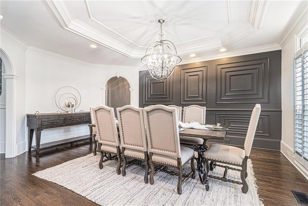 240 Wicklawn Way Roswell, GA 30076 - Photo 10 of 62 a view of a dining room with furniture and wooden floor