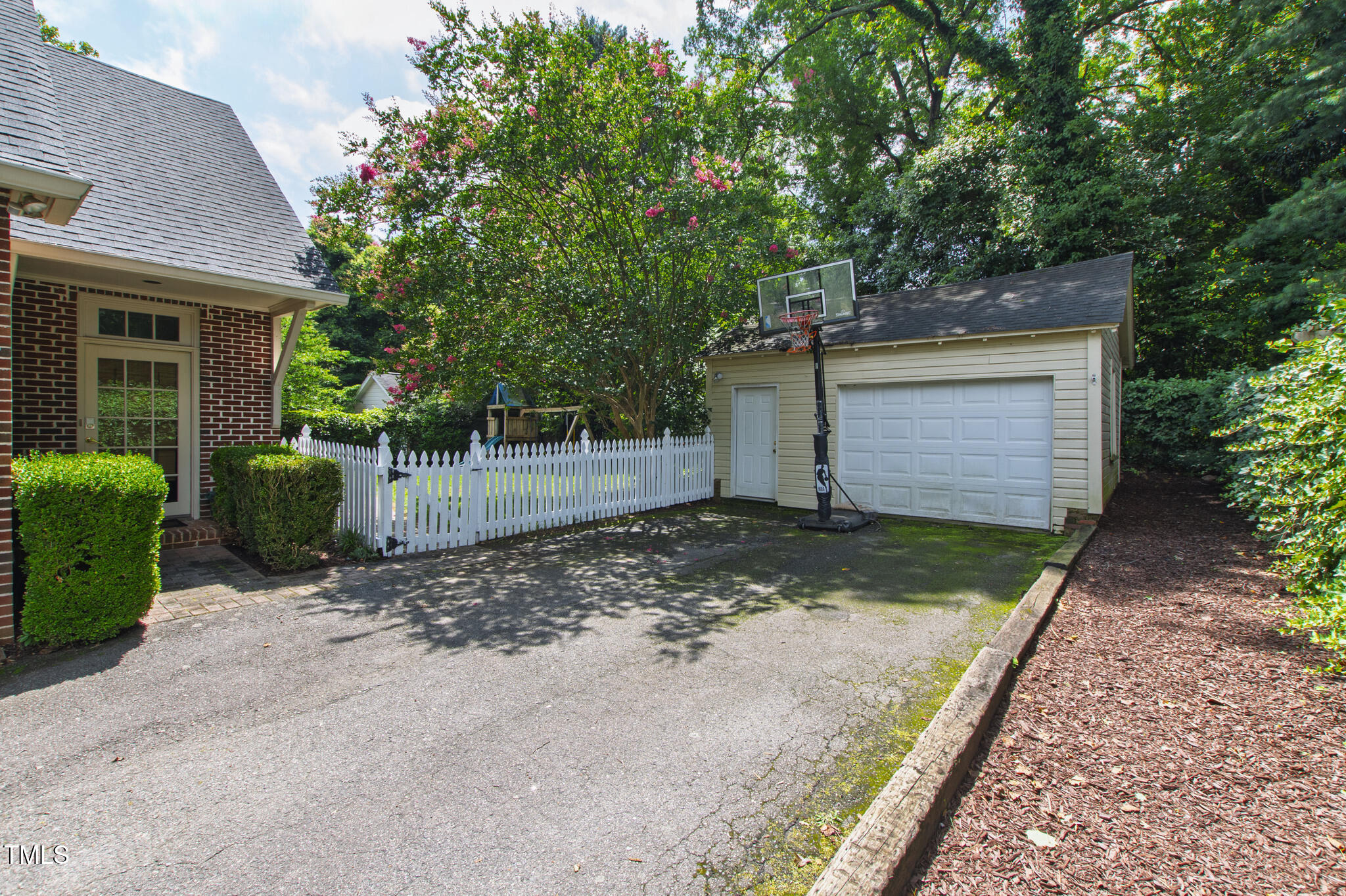 2328 Byrd Street Raleigh, NC 27608 - Photo 4 of 44 garage and fence