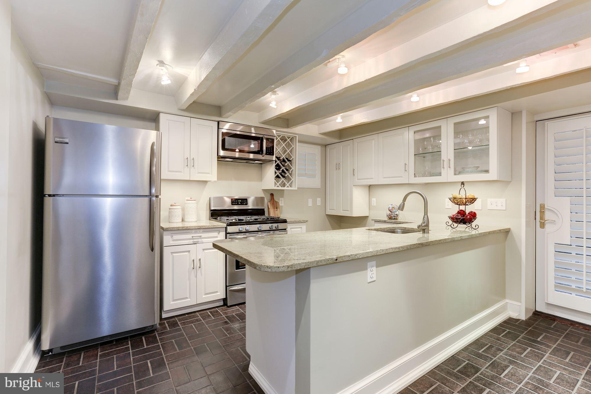 3522 P Street Northwest Washington, DC 20007 - Photo 16 of 30 Large granite peninsula