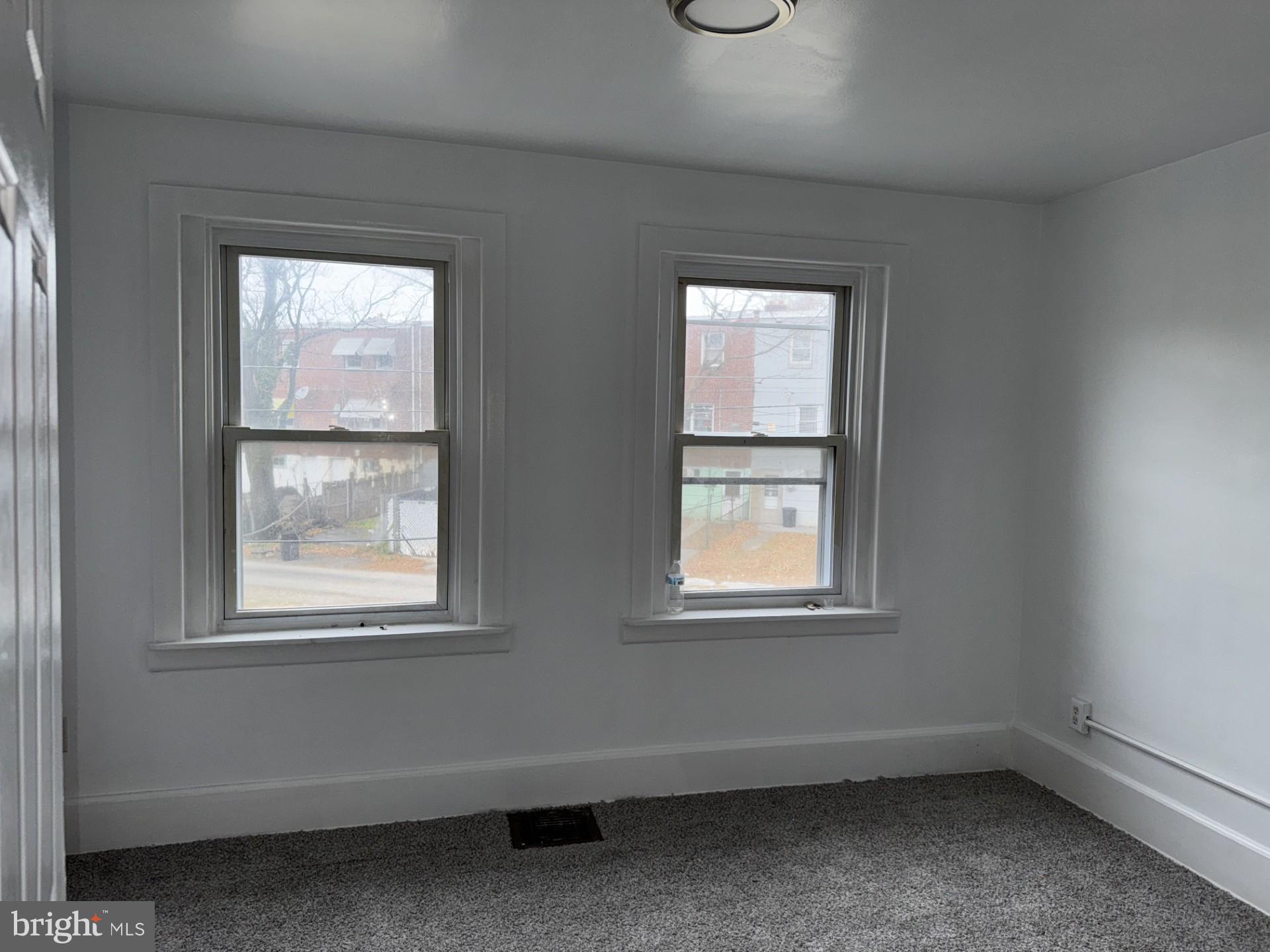 620 Keystone Avenue Darby, PA 19023 - Photo 7 of 13 an empty room with a window