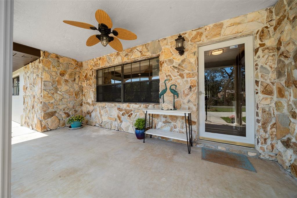 9923 East St Regis Court Inverness, FL 34450 - Photo 39 of 76 a view of livingroom with furniture and a flat screen tv