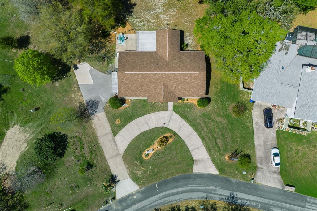 9923 East St Regis Court Inverness, FL 34450 - Photo 7 of 76 an aerial view of a house