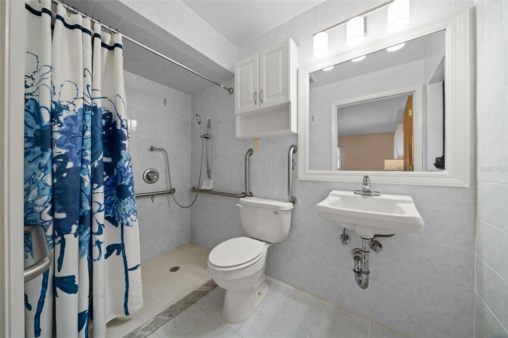 9923 East St Regis Court Inverness, FL 34450 - Photo 73 of 76 a bathroom with a toilet sink and shower