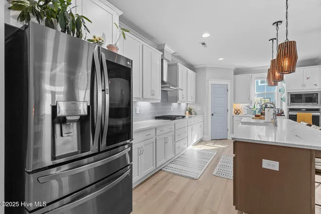 $782,500 | 592 Moss Lake Lane, Holly Ridge, NC 28445