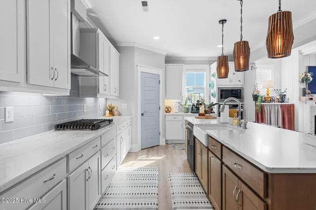 $782,500 | 592 Moss Lake Lane, Holly Ridge, NC 28445