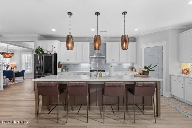 $782,500 | 592 Moss Lake Lane, Holly Ridge, NC 28445