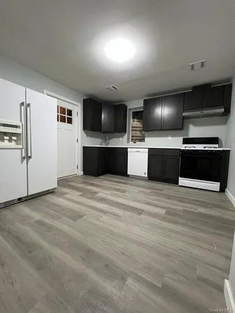 a view of kitchen with a sink