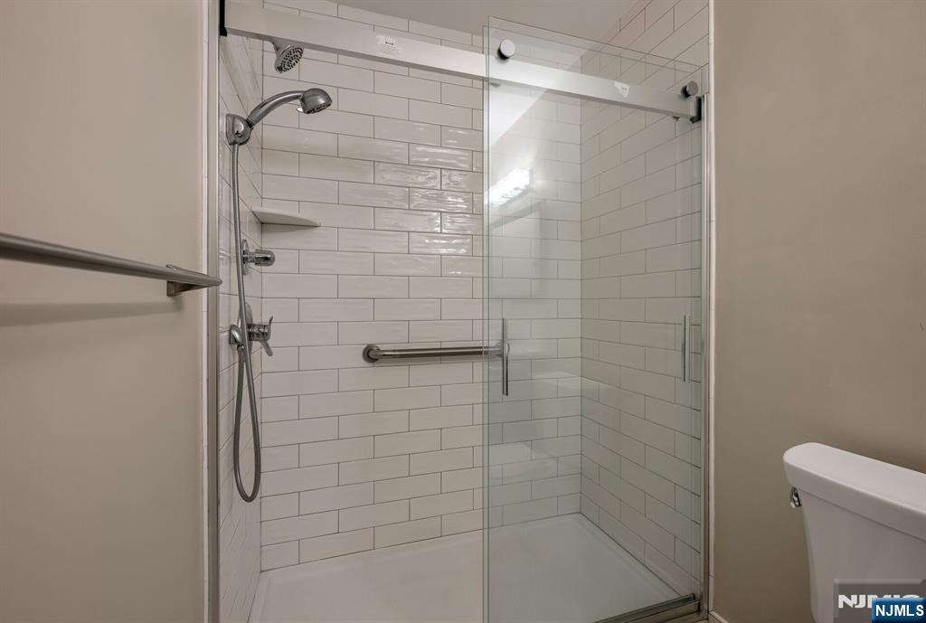 1155 Garrison Court Mahwah, NJ 07430 - Photo 18 of 26 a bathroom with a shower