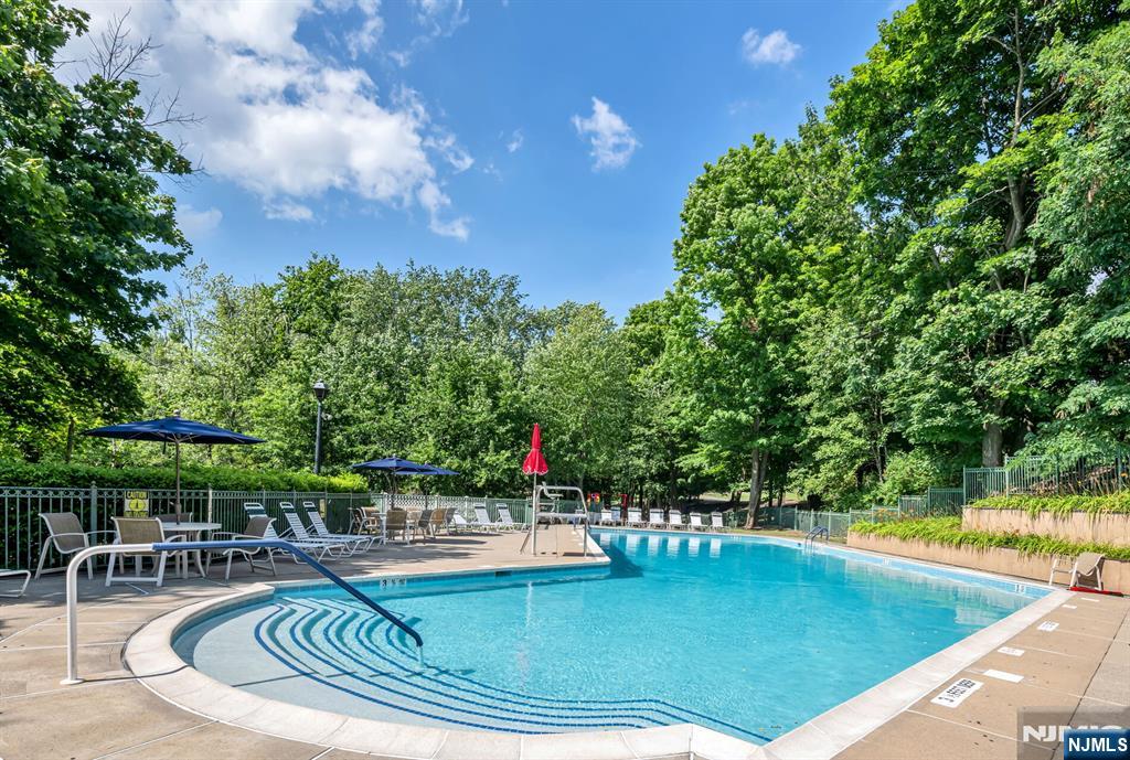 1155 Garrison Court Mahwah, NJ 07430 - Photo 25 of 26 a view of a swimming pool with chairs