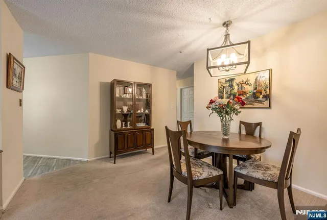 a view of a livingroom and dining room