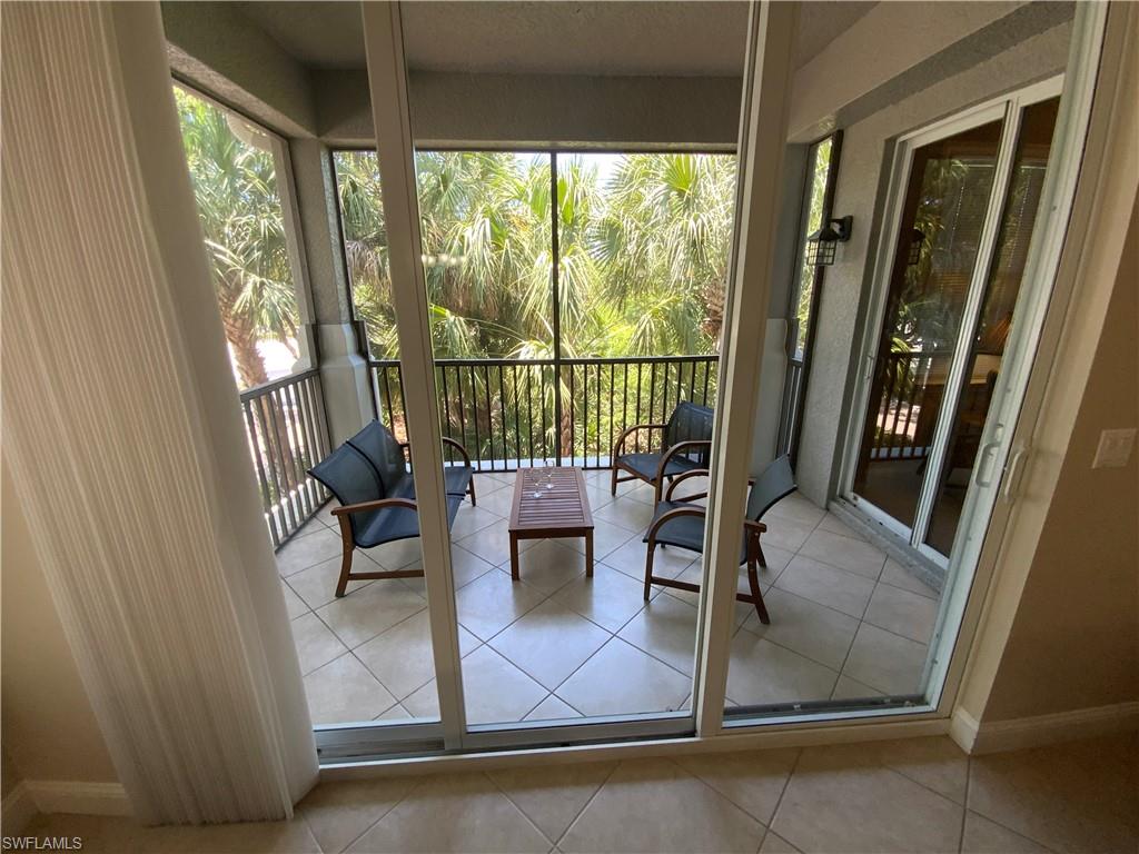 1315 Remington Way, Unit 1201 Naples, FL 34110 - Photo 9 of 20 Sunroom / solarium featuring plenty of natural light