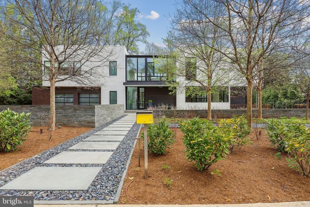 a view of a house with a swimming pool