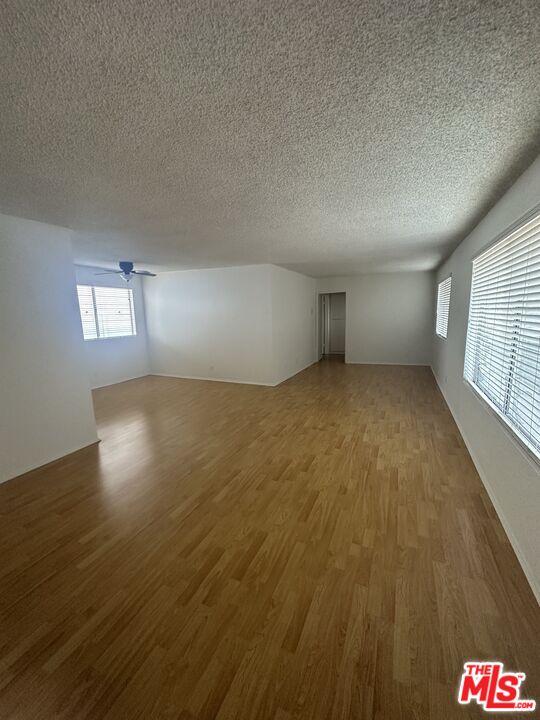 11525 Rochester Avenue, Unit 201 Los Angeles, CA 90025 - Photo 3 of 12 a view of an empty room and window
